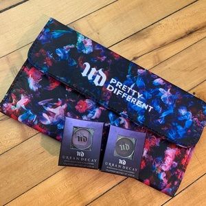 Urban Decay Eyeshadows, and a makeup brush holder.